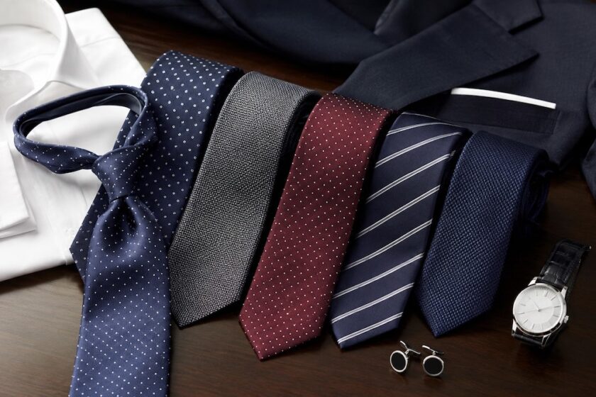 Cravatte eleganti in seta con camicia, giacca sartoriale e accessori maschili raffinati